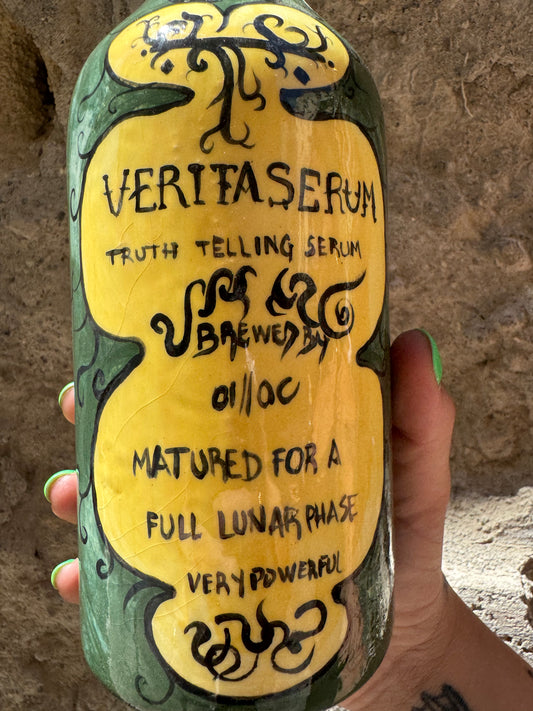 Siero Verita di Oilloc2 in bottiglia con contagocce, per la cura della pelle e idratazione del viso.